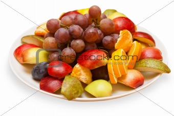 Fruits on a plate isolated on white background