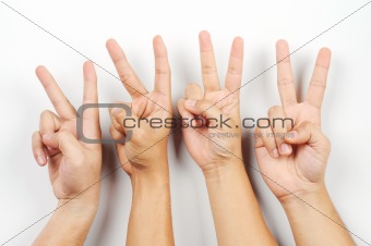 four hands with peace symbols