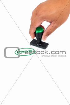 Hand hold approved Stamp in Green Color