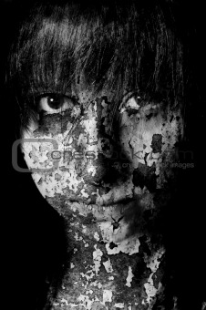 Dark art portrait of a girl with cracks and old paint 