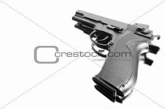 Angle view of a pistol isolated over white