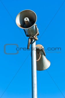 loudspeaker against blue sky