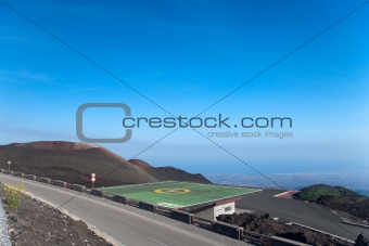 Heliport near volcano, with city in background, Etna, Sicily, It