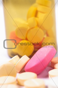 A bottle of medicines with white isolated background