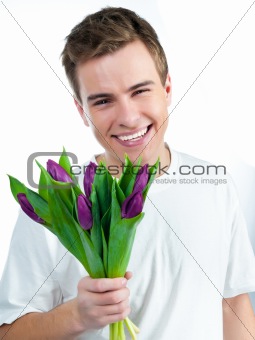 man with a bouquet of tulips