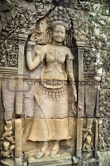 Apsara carved on the wall at bayon, cambodia