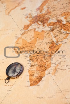 World map with compass showing Africa