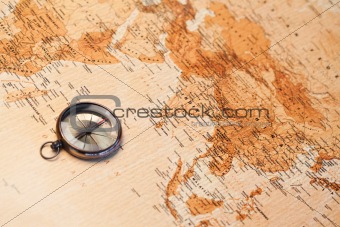 World map with compass showing Africa and Asia