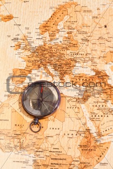 World map with compass showing North Africa and Europe