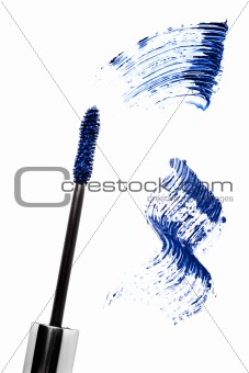 Blue mascara stroke and brush  isolated on white