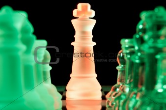 red and green glass chess pieces