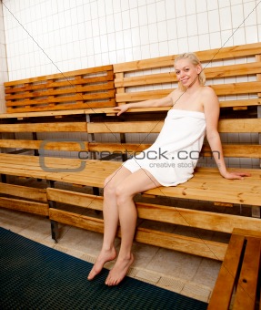 Happy Woman in Sauna