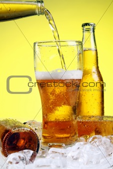 Beer is pouring into glass 