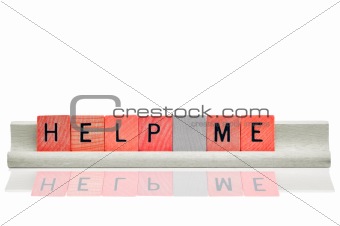 Help me in red wooden letters