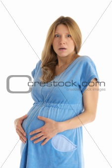 astonished pregnant woman in bathrobe
