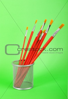 Red art brushes on the color background