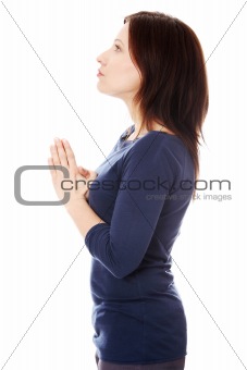 Middle aged woman praying 