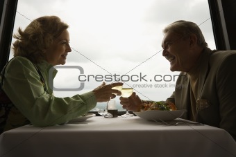 Mature couple at dinner.