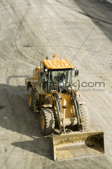 Freeway construction; bulldozer from above