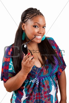 beautiful black woman holding sunglasses 