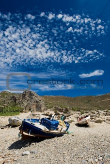 Rusty old boat on the shore in Greece island Crete