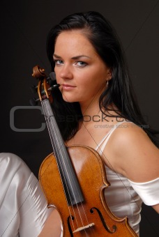 beautiful girl paying the violin