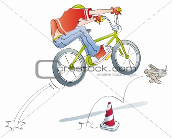 boy practicing jumps bike