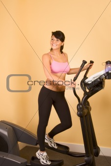Attractive young sweat woman doing cardio workout