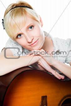 blond woman with guitar on isolated white