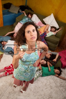 Woman with wine and girls at sleepover