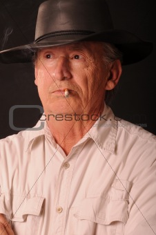 Old smoking cowboy