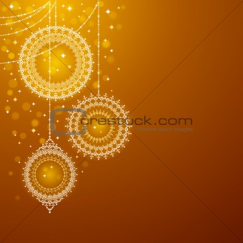 Christmas ornaments on golden background