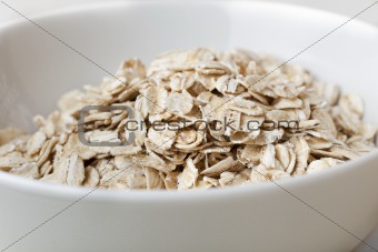 Dry oatmeal in a bowl