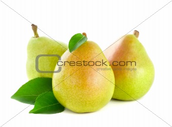 Fresh pear with green leaves