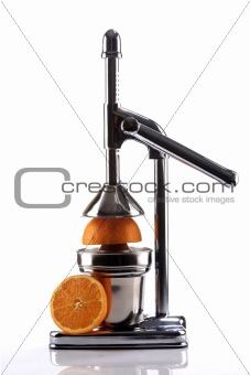 Chrome Citrus Juicer and Orange Halves