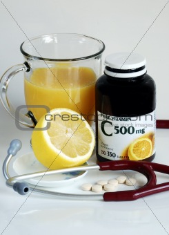 Rich in Vitamin C: orange juice, lemon, and supplement pills
