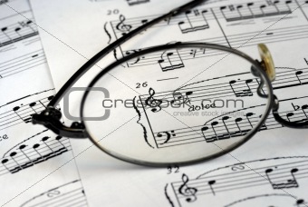 The glasses focus on the music symbols