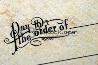 Close-up view of the phrase “Pay To The Order Of”