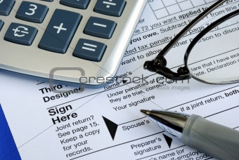 Finish and sign the income tax return isolated on blue