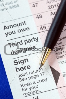 Sign the income tax return isolated on blue