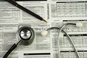 A stethoscope on the top of a medical utilization document concepts of optimizing the medical benefit