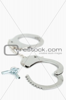 Portrait of handcuffs and keys