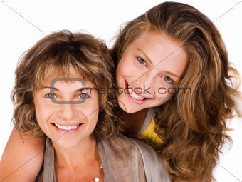 Close-up of smiling elder mum and daughter