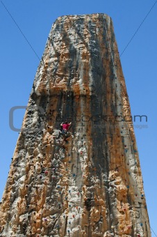 Boy on a big climbing wall