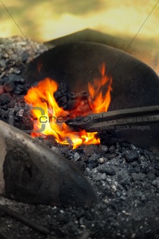 Blacksmith heating up iron - detail