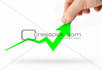 Hand rising green business graph