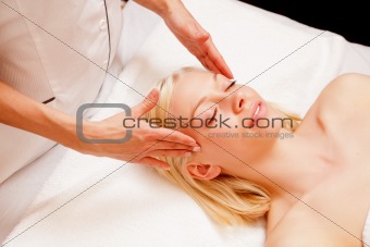 Woman Receiving Spa Massage