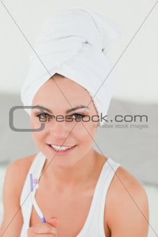Cute woman about to brush her teeth