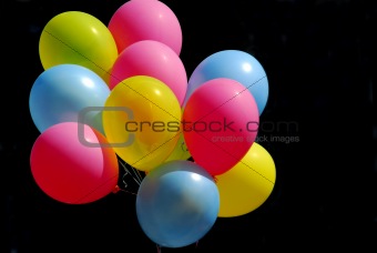 Colorful balloons on black