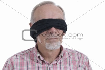 Senior man with blindfold isolated on white